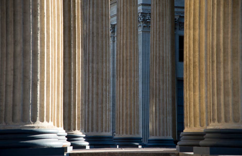 Elegant neoclassical columns showcasing architectural grandeur in St. Petersburg, Russia.